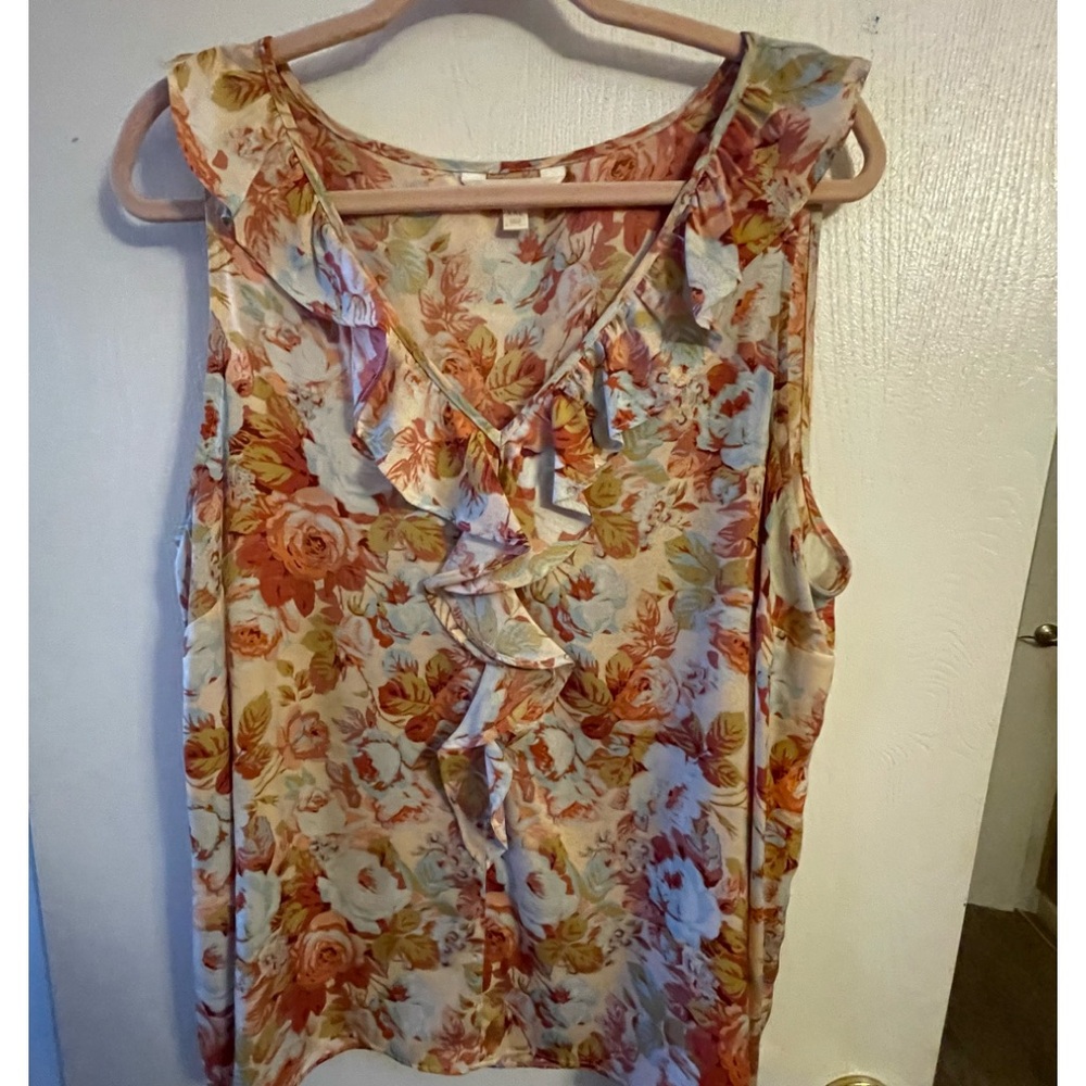 Beautiful tank by Lauren Conrad somehow I ordered 2. Oops size XXL